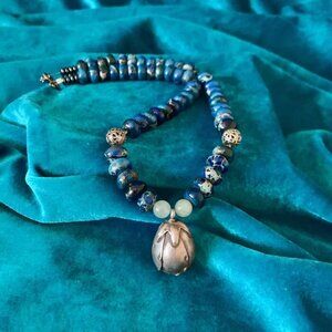 Azurite blue bead necklace with sterling silver closed flower pendant
